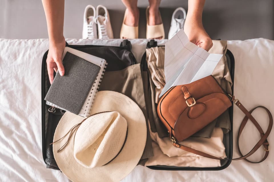 Koffer für die Flitterwochen packen