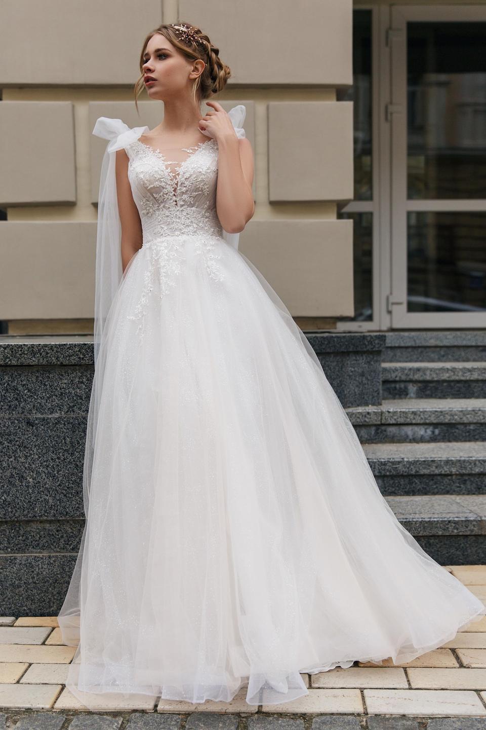 glitzerndes Hochzeitskleid mit Oberteil aus Spitze