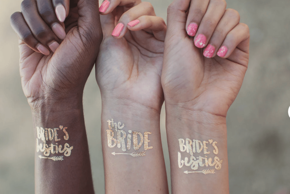 Goldenes Klebe-Tattoo Teambride