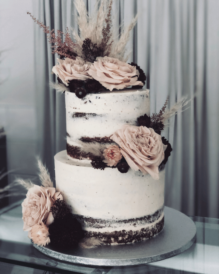 Eine Vintage Hochzeitstorte mit Pastelltönen